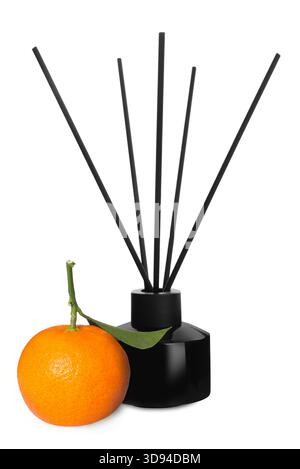 Citrus scented reed diffuser and fresh tangerine isolated on white Stock Photo