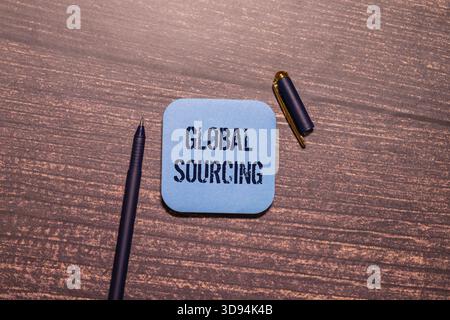 Global sourcing is shown using a text. Stock Photo