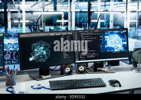 Close up of data center PCs monitoring AI LLM model rackmounts performance used in automation workloads. Workstation monitors overseeing artificial intelligence server rigs equipment Stock Photo