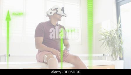 Sitting man wearing maroon polo using VR headset in rehab room, with prosthetic leg and HUD Stock Photo