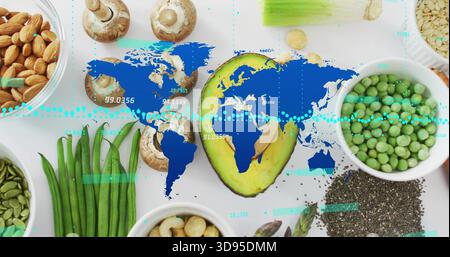Displaying halved avocado sitting on white table, showing peas, almonds, oats, blue data overlay Stock Photo