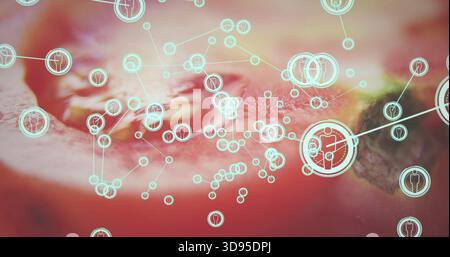Showing teal network overlay on macro strawberry close-up, with big icon nodes and connecting lines Stock Photo