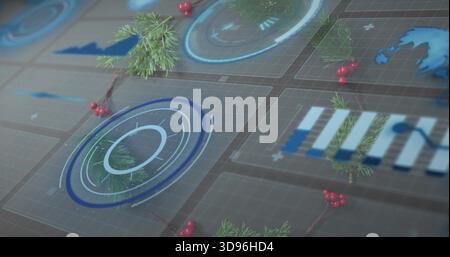 Displaying circular HUD target glowing blue on glass grid tiles with pine sprigs and red berries Stock Photo