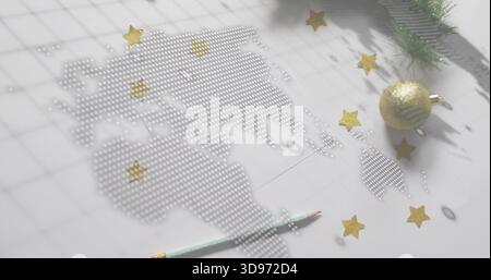 Displaying dotted world map of perforations on white grid paper desk, with gold ornament and pencil Stock Photo
