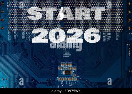 New year 2026 start or goal concept. Text 2026, written on the electronic computer circuit board hardware technology. Motherboard digital chip. Comput Stock Photo