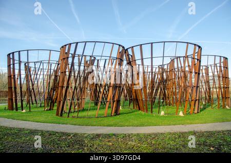 Dwaaltuin (Maze Garden) by Gijs Van Vaerenbergh, a Cor-Ten steel labyrinth sculpture, in a park in Heverlee, Leuven, Belgium Stock Photo