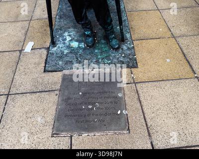 Manchester, UK - November 07, 2025: A bronze Victory Over Blindness statue plaque on a paved Manchester plaza marks the WWI centenary and city’s remem Stock Photo