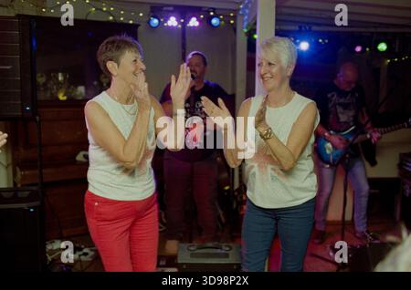 Patrons of the The Railway Tavern,Dereham,Norfolk,UK cheering  as the clock struck eleven pm on  Friday 31st January 2020, signifyng Britain’s exit from the EU. Stock Photo