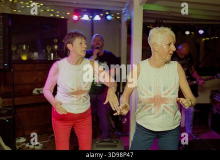 Patrons of the The Railway Tavern,Dereham,Norfolk,UK cheering  as the clock struck eleven pm on  Friday 31st January 2020, signifyng Britain’s exit from the EU. Stock Photo