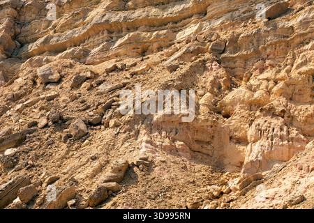 Rock layers texture. Abstract background of brown rock. Stock Photo