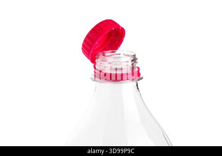 Close-up of a clear plastic bottle with a red cap against a white background Stock Photo