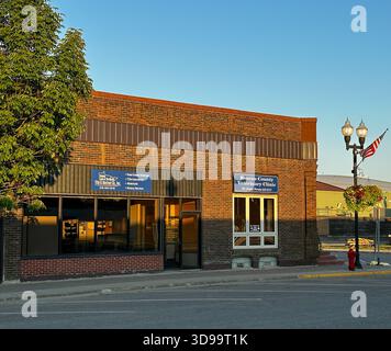 ROSEAU, MN - 21 JUL 2025: Two business in a brick building on Main Street on a summer eveing in northern Minnesota. Stock Photo