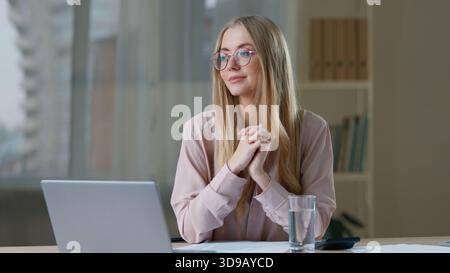 Caucasian happy business woman with laptop and glass of water smiling in office worker girl female businesswoman with drink smile cheerful healthy Stock Photo