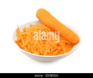 Bowl with grated fresh carrots and a whole peeled carrot isolated on a white background. High quality photo Stock Photo