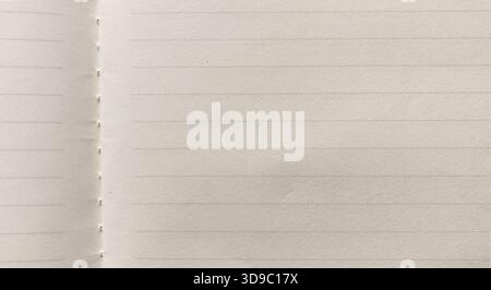 Clean Blank Lined Page from Saddle-Stitch Journal or Notebook with Copy Space for Education and Writing Concepts Stock Photo
