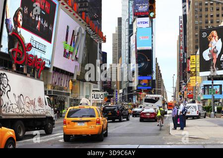 New York, NY, USA - May 17, 2013: Times Square, featured with Broadway Theaters and huge number of LED signs, is a symbol of New York City and the Uni Stock Photo