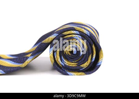 Rolled up stripy necktie isolated on a white background Stock Photo