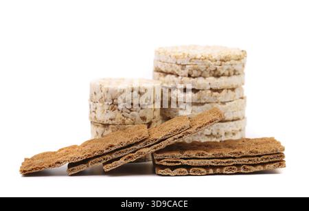 Whole grain crisp bread and puffed rice snack. White background Stock Photo