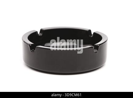 Empty black ceramic ashtray isolated on white Stock Photo