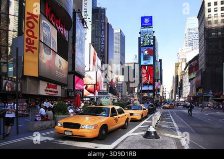 New York, NY, USA - May 17, 2013: Times Square, featured with Broadway Theaters and huge number of LED signs, is a symbol of New York City and the Uni Stock Photo