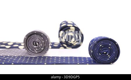 Bright rolled ties isolated on white background Stock Photo