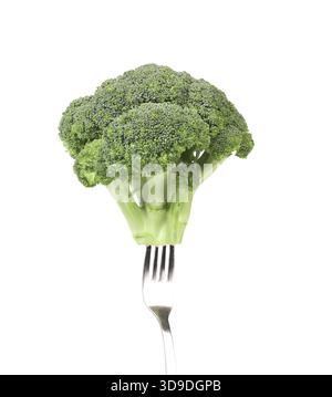 Broccoli impaled on a fork. Isolated on a white background Stock Photo