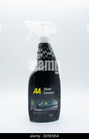 Irvine, Scotland, UK - November 27, 2025: AA branded automobile windscreen glass cleaner in a plastic spray bottle and applicator that are both recycl Stock Photo
