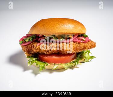 delicious chicken burger with salad on a white background Stock Photo