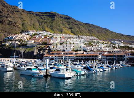 Harbour of Los Gigantes, Island Tenerife, Canary Islands, Spain, Europe. Boats in the harbour of Los Gigantes. Stock Photo