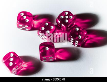 purple dice on a white background, close up Stock Photo