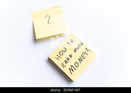 How to earn more money - sticky notes concept Stock Photo