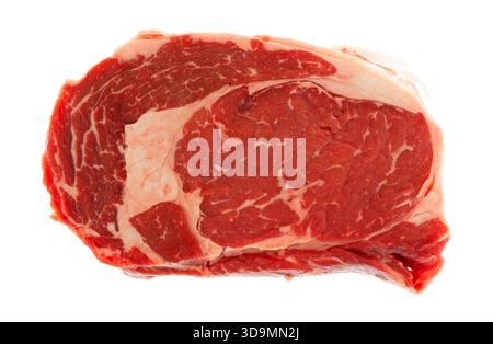 Overhead view of a single ribeye steak isolated on a white background. Stock Photo