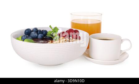 Healthy breakfast. Oatmeal with nuts, berries, jam, coffee and juice isolated on white Stock Photo