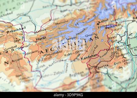 Detailed map close-up of Afghanistan, showcasing the country's rugged mountain ranges like Koh-i-Sangan, and major cities like Herat and Kandahar. Stock Photo