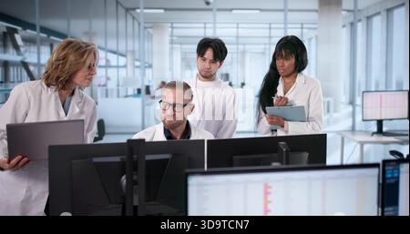 Doctor Conducts Hospital Audit To Ensure Accuracy Of Medical Bills. Medical Coder Analyzes Healthcare Invoices Stock Photo