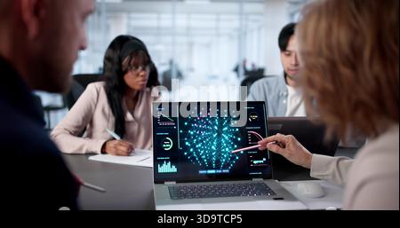 Diverse Group Of Engineers And Researchers Meet To Discuss Analytics. Stock Photo