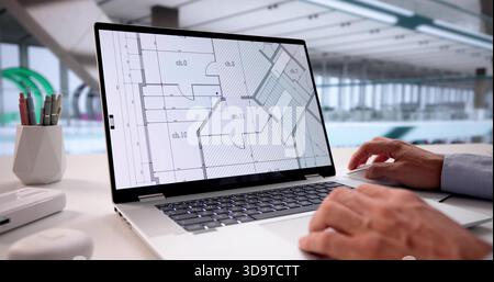 Skilled Civil Engineer Focuses On Project Blueprints For House Construction Stock Photo
