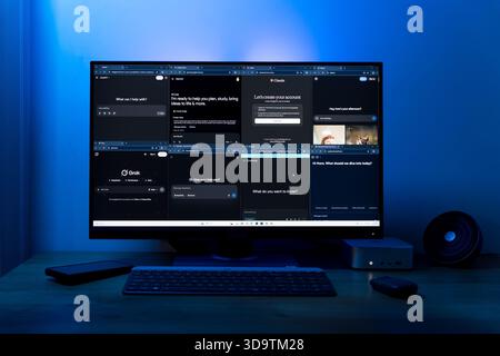 Computer monitor displaying multiple AI chatbots including ChatGPT Gemini Claude Grok DeepSeek and Copilot Stock Photo