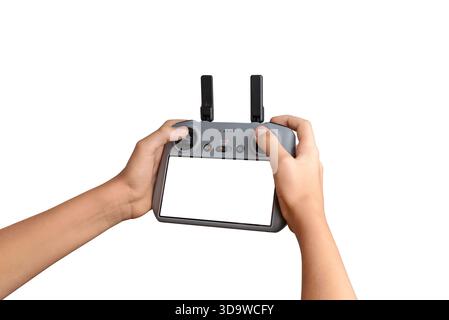 Hands holding a drone controller with empty screen, ideal for UI mockups, drone software previews, and technology product demonstrations Stock Photo
