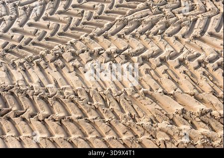 Tyre track pattern in sand, UK Stock Photo