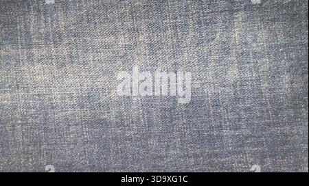 Navy blue denim texture. Blank dirty jean denim cloth textile background. Grunge structure design. Flat cotton surface. Dark navy material. Indigo vin Stock Photo