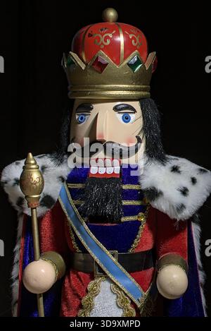 Dramatic Vertical Portrait of a Nutcracker King on Black Stock Photo