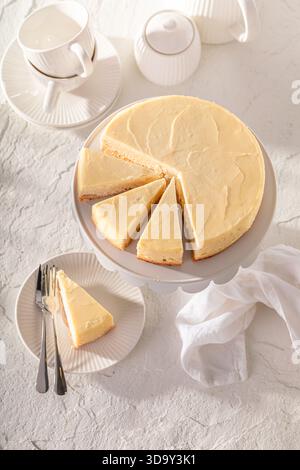 Sweet New york cheesecake made of vanilla and mascarpone. New york cheesecake on tart. Stock Photo