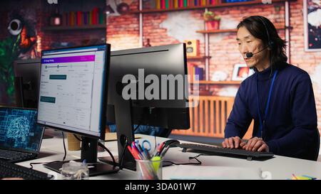 IT tech support employee assisting clients needing help, providing accurate information using AI. Call center senior agent helping customers, fixing technical issues using artificial intelligence Stock Photo