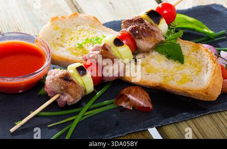 Mutton slices on barbecue skewers Stock Photo