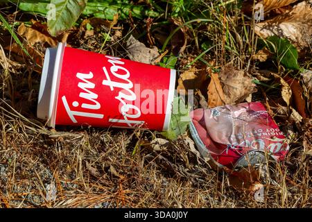 Empty beverage cup on the ground Stock Photo
