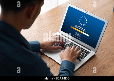 Software update on computer for modish version of device software upgrade Stock Photo