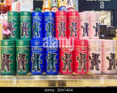 Penang, Malaysia - July 7, 2025: jars of tea teddies fruit gums in various flavors including apple, blueberry, and strawberry are neatly arranged on s Stock Photo
