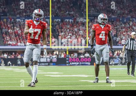 Ohio State wide receiver Jeremiah Smith holds a football after catching ...