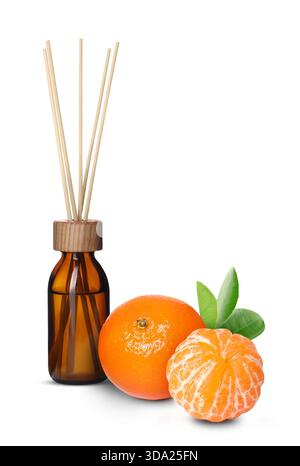 Citrus scented reed diffuser and fresh tangerines isolated on white Stock Photo